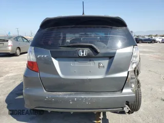 2013 Honda Fit Sport z VIN JHMGE8H53DC026920, wystawiony jako Copart lot #58505615 z przebiegiem 132 286 mil mil oraz Szkoda całkowita • Salvage title. Historia ofert i sprzedaży dostępna na DreamBid. Obrazek 6.