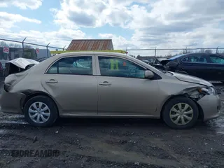 2010 Toyota Corolla with VIN 2T1BU4EE0AC312979, listed as a IAAI auction lot 41981699 with 156,842 mi miles. Bid and sale history available at carsss.com. Image 13.