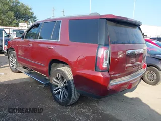 2017 GMC Yukon Denali with VIN 1GKS1CKJ4HR141145, listed as a IAAI auction lot 40799652 with 104,369 mi miles. Bid and sale history available at carsss.com. Image 3.