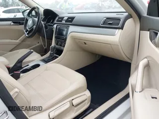 2019 Volkswagen Passat Wolfsburg Edition z VIN 1VWLA7A38KC004758, wystawiony jako IAAI lot #42404110 z przebiegiem 71 694 mil mil oraz . Historia ofert i sprzedaży dostępna na DreamBid. Obrazek 5.