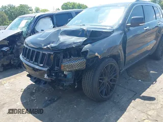 2014 Jeep Grand Cherokee Limited with VIN 1C4RJFBG3EC545861, listed as a IAAI auction lot 42216743 with 160,000 mi miles and . Bid and sale history available at DreamBid. Image 6.