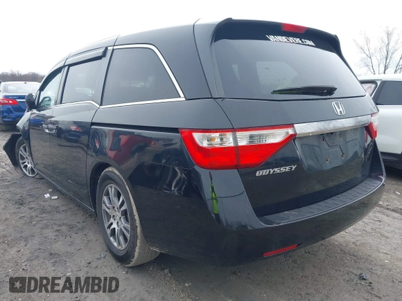 2012 Honda Odyssey EX-L with VIN 5FNRL5H63CB070361, listed as a IAAI auction lot 42025024 with 152,258 mi miles and . Bid and sale history available at carsss.com. Image 3.