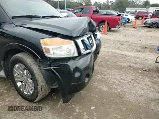 2015 Nissan Armada Platinum z VIN 5N1BA0NF5FN610793, wystawiony jako Copart lot #88765185 z przebiegiem 174 327 mil mil oraz Szkoda całkowita • Salvage title. Historia ofert i sprzedaży dostępna na DreamBid. Obrazek 11.