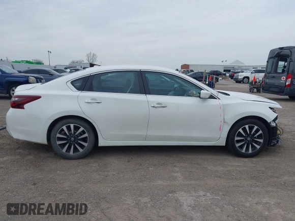 2018 Nissan Altima SR with VIN 1N4AL3AP9JC210806, listed as a IAAI auction lot 41735439 with 134,119 mi miles and . Bid and sale history available at DreamBid. Image 13.