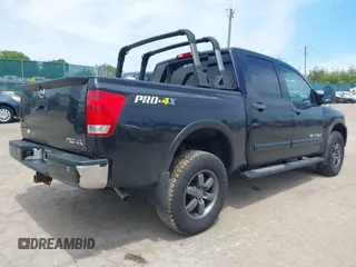 2013 Nissan Titan SV with VIN 1N6AA0EC4DN302479, listed as a IAAI auction lot 42383255 with 112,991 mi miles and . Bid and sale history available at DreamBid. Image 4.
