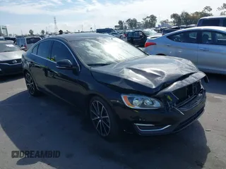 2016 Volvo S60 T5 Drive-E Premier with VIN YV126MFK4G2410882, listed as a IAAI auction lot 41678078 with 125,507 mi miles. Bid and sale history available at carsss.com. Image 1.