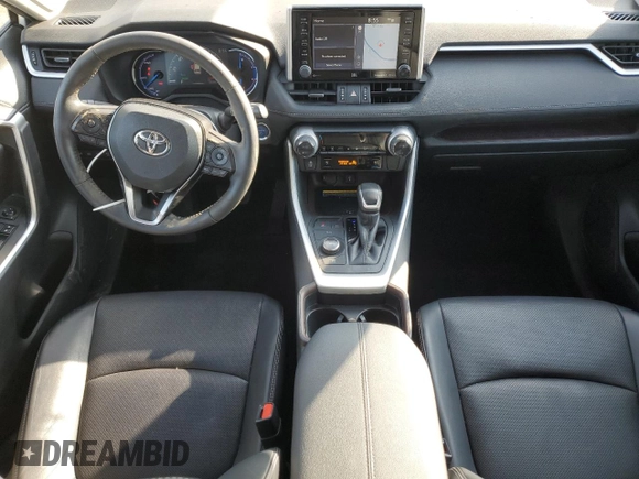 2020 Toyota RAV4 Hybrid Limited z VIN 4T3DWRFV0LU004797, wystawiony jako Copart lot #54181595 z przebiegiem 63 055 mil mil oraz Szkoda całkowita • Salvage title. Historia ofert i sprzedaży dostępna na DreamBid. Obrazek 8.