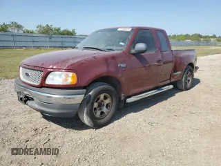 1999 Ford F-150 XL with VIN 1FTZX0729XKB51749, listed as a Copart auction lot 75480674 with Not provided miles and Salvage title. Bid and sale history available at DreamBid. Image 1.