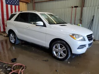 2015 Mercedes-Benz M 350 with VIN 4JGDA5HB8FA582087, listed as a Copart auction lot 62895635 with 95,928 mi miles and Salvage title. Bid and sale history available at DreamBid. Image 4.