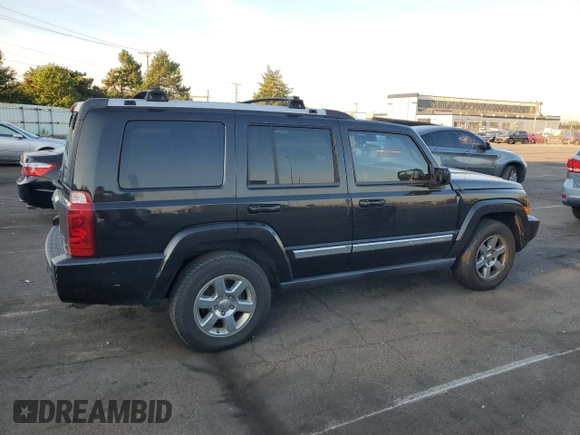 2008 Jeep Commander Limited with VIN 1J8HH58N98C236772, listed as a Copart auction lot 71042404 with 217,780 mi miles and Salvage title. Bid and sale history available at DreamBid. Image 3.