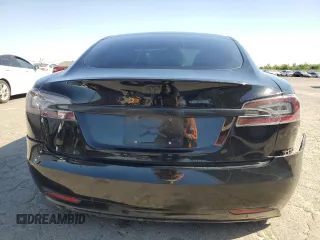 2018 Tesla Model S 75D с VIN 5YJSA1E27JF271596, выставлен на аукционе Copart как лот 57681565 с пробегом 106 710 миль миль и Списание • Salvage title. История ставок и продаж доступна на DreamBid. Изображение 6.