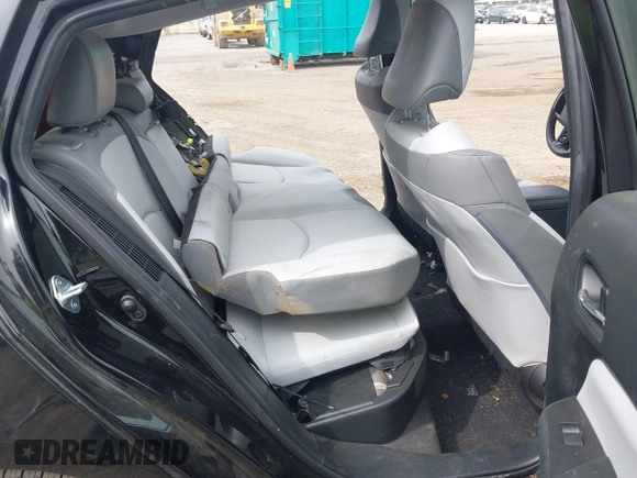 2021 Toyota Prius LE z VIN JTDKAMFP0M3179016, wystawiony jako IAAI lot #42204095 z przebiegiem 34 691 mil mil oraz . Historia ofert i sprzedaży dostępna na DreamBid. Obrazek 8.