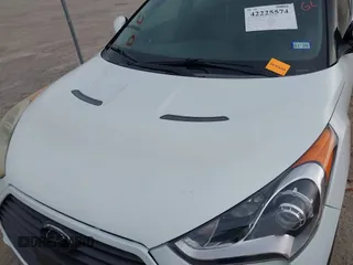 2013 Hyundai Veloster Turbo with VIN KMHTC6AE5DU104074, listed as a IAAI auction lot 42225574 with 172,836 mi miles and . Bid and sale history available at DreamBid. Image 6.
