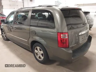 2010 Dodge Grand Caravan SXT z VIN 2D4RN5D14AR416488, wystawiony jako IAAI lot #38412602 z przebiegiem 136 997 mil mil oraz . Historia ofert i sprzedaży dostępna na DreamBid. Obrazek 3.