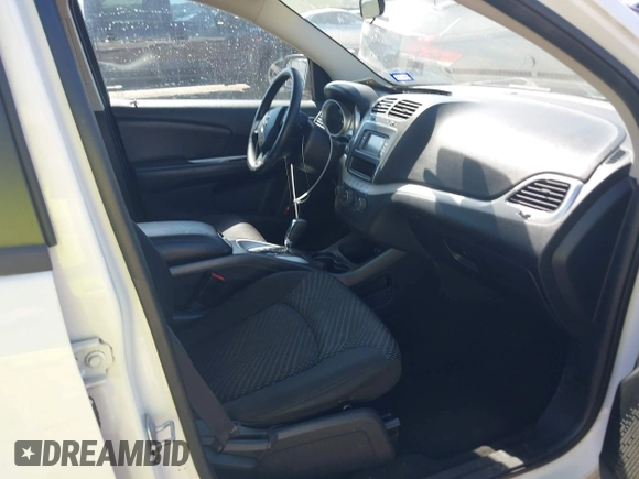 2014 Dodge Journey SE with VIN 3C4PDCAB2ET258681, listed as a IAAI auction lot 42558132 with 136,569 mi miles and . Bid and sale history available at DreamBid. Image 5.