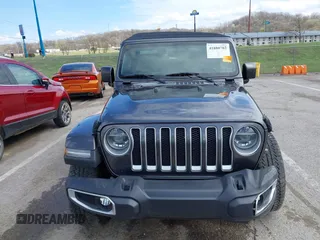 2019 Jeep Wrangler Unlimited Sahara with VIN 1C4HJXEN3KW622167, listed as a IAAI auction lot 41880702 with 72,928 mi miles and . Bid and sale history available at DreamBid. Image 13.
