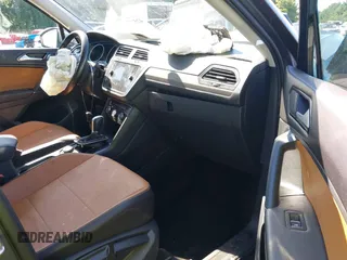 2018 Volkswagen Tiguan SEL with VIN 3VV2B7AX8JM088223, listed as a IAAI auction lot 42547747 with 105,423 mi miles and . Bid and sale history available at DreamBid. Image 5.
