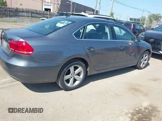 2014 Volkswagen Passat S with VIN 1VWAT7A31EC059218, listed as a IAAI auction lot 42406929 with 85,287 mi miles and . Bid and sale history available at DreamBid. Image 4.