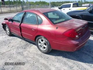 2003 Ford Taurus SES Standard with VIN 1FAFP55203G189473, listed as a IAAI auction lot 42013813 with 99,769 mi miles. Bid and sale history available at carsss.com. Image 3.