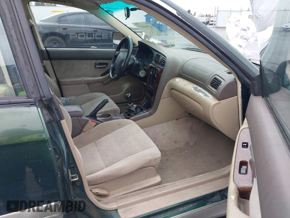 2002 Subaru Legacy Outback z VIN 4S3BH665326608814, wystawiony jako IAAI lot #41846027 z przebiegiem 210 638 mil mil oraz . Historia ofert i sprzedaży dostępna na DreamBid. Obrazek 5.
