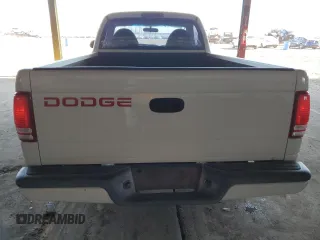 1999 Dodge Dakota SLT with VIN 1B7FL26X6XS180827, listed as a Copart auction lot 85789944 with 85,166 mi miles and Salvage Title. Bid and sale history available at carsss.com. Image 6.