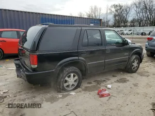 1998 Oldsmobile Bravada z VIN 1GHDT13W9W2730673, wystawiony jako Copart lot #80996524 z przebiegiem 126 418 mil mil oraz Nie do naprawy. Historia ofert i sprzedaży dostępna na DreamBid. Obrazek 3.