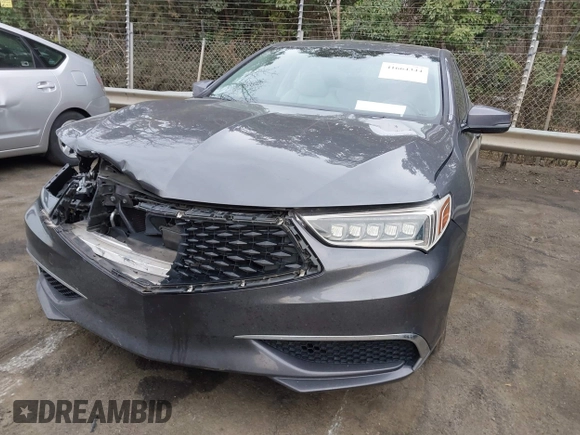 2019 Acura TLX with VIN 19UUB1F36KA004085, listed as a IAAI auction lot 41664344 with 115,125 mi miles. Bid and sale history available at carsss.com. Image 12.