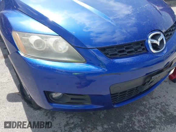 2007 Mazda CX-7 Sport with VIN JM3ER293370157768, listed as a IAAI auction lot 41924682 with 123,391 mi miles. Bid and sale history available at carsss.com. Image 6.