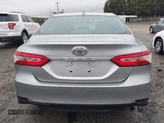 2020 Toyota Camry LE with VIN 4T1C11AK5LU869525, listed as a IAAI auction lot 41693706 with 134,201 mi miles. Bid and sale history available at carsss.com. Image 16.