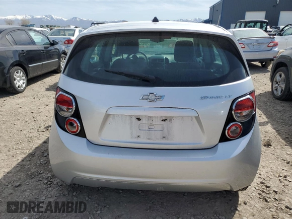 2013 Chevrolet Sonic LT with VIN 1G1JC6SH8D4230572, listed as a Copart auction lot 52034505 with 173,553 mi miles and Clean Title. Bid and sale history available at carsss.com. Image 6.