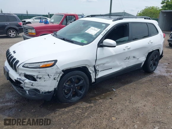 2016 Jeep Cherokee Altitude with VIN 1C4PJMCB3GW121211, listed as a IAAI auction lot 42470241 with 168,343 mi miles and . Bid and sale history available at DreamBid. Image 2.