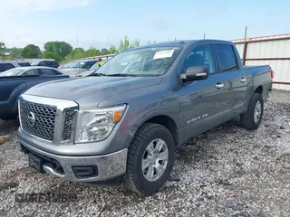 2018 Nissan Titan SV z VIN 1N6AA1EJ0JN518166, wystawiony jako IAAI lot #42124998 z przebiegiem 99 443 mil mil oraz . Historia ofert i sprzedaży dostępna na DreamBid. Obrazek 2.