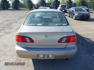 1998 Toyota Corolla VE z VIN 2T1BR18E9WC045442, wystawiony jako IAAI lot #42104201 z przebiegiem 243 256 mil mil oraz . Historia ofert i sprzedaży dostępna na DreamBid. Obrazek 16.