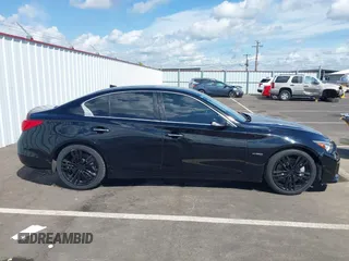 2014 Infiniti Q50 Hybrid Premium with VIN JN1AV7AP8EM691436, listed as a IAAI auction lot 42138263 with 93,253 mi miles and . Bid and sale history available at DreamBid. Image 14.