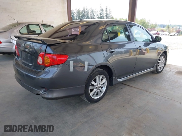 2009 Toyota Corolla with VIN 1NXBU40E79Z133873, listed as a IAAI auction lot 42132035 with 232,578 mi miles. Bid and sale history available at carsss.com. Image 4.