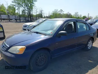 2003 Honda Civic LX with VIN 2HGES16583H594640, listed as a IAAI auction lot 42157801 with 167,981 mi miles. Bid and sale history available at carsss.com. Image 2.