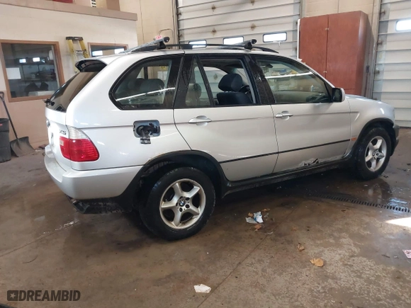 2003 BMW X5 3.0i with VIN 5UXFA53543LV80219, listed as a IAAI auction lot 41555874 with 247,481 mi miles. Bid and sale history available at carsss.com. Image 4.