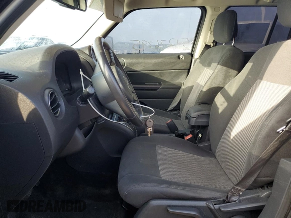 2014 Jeep Patriot Latitude with VIN 1C4NJPFB8ED850608, listed as a Copart auction lot 51276395 with 147,809 mi miles and Clean Title. Bid and sale history available at carsss.com. Image 7.
