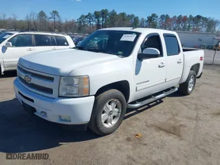 2010 Chevrolet Silverado 1500 LT with VIN 3GCRKSE35AG262187, listed as a IAAI auction lot 41883053 with 156,505 mi miles. Bid and sale history available at carsss.com. Image 2.