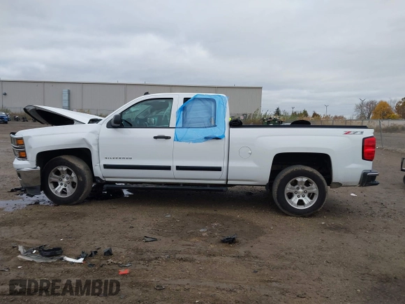 2014 Chevrolet Silverado 1500 LT with VIN 1GCVKREC2EZ390061, listed as a IAAI auction lot 40824477 with 140,928 mi miles and . Bid and sale history available at DreamBid. Image 14.