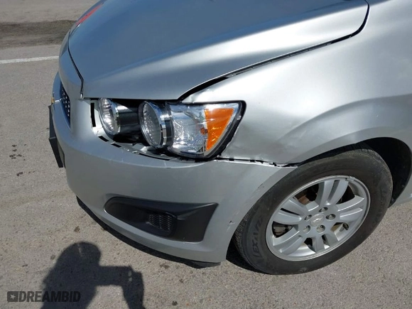 2014 Chevrolet Sonic LT with VIN 1G1JC5SH6E4234289, listed as a IAAI auction lot 41879362 with 193,067 mi miles. Bid and sale history available at carsss.com. Image 6.