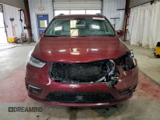 2021 Chrysler Pacifica Hybrid Touring L with VIN 2C4RC1L77MR596250, listed as a Copart auction lot 52892595 with 114,876 mi miles and Salvage title. Bid and sale history available at DreamBid. Image 5.
