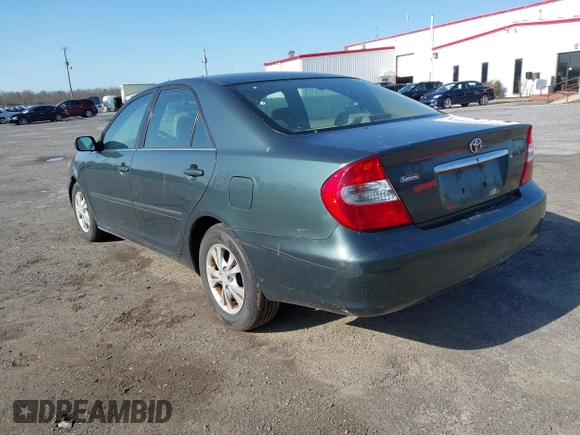 2004 Toyota Camry LE with VIN 4T1BF32K04U074276, listed as a IAAI auction lot 41940050 with 266,420 mi miles and . Bid and sale history available at DreamBid. Image 3.