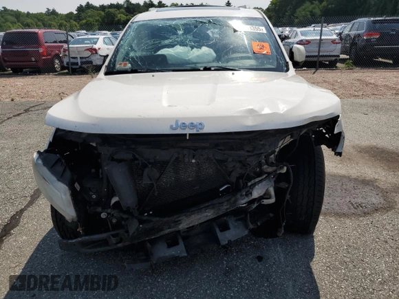 2011 Jeep Grand Cherokee Laredo with VIN 1J4RR4GG6BC657520, listed as a Copart auction lot 63558355 with 215,444 mi miles and Salvage title. Bid and sale history available at DreamBid. Image 5.