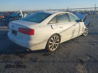 2013 Audi A6 Premium Plus z VIN WAUGGAFC6DN080377, wystawiony jako IAAI lot #41132555 z przebiegiem Nie podano mil oraz . Historia ofert i sprzedaży dostępna na DreamBid. Obrazek 4.