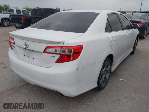 2014 Toyota Camry L with VIN 4T1BF1FK1EU851712, listed as a IAAI auction lot 41940311 with 158,097 mi miles. Bid and sale history available at carsss.com. Image 4.