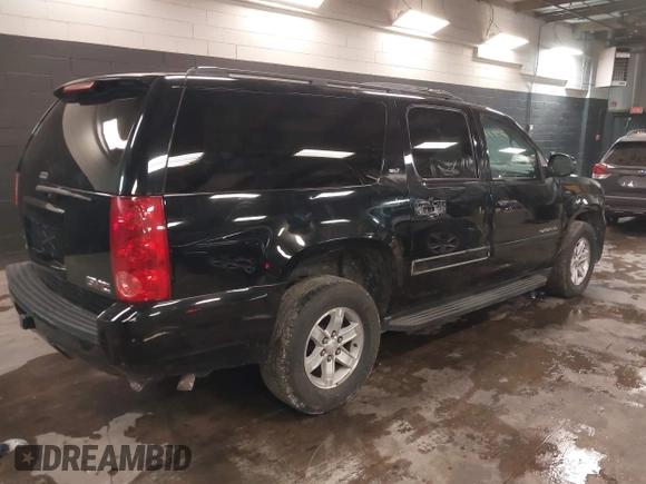 2013 GMC Yukon XL SLT with VIN 1GKS2KE76DR301365, listed as a IAAI auction lot 41379118 with 108,569 mi miles. Bid and sale history available at carsss.com. Image 4.