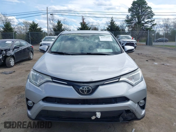 2018 Toyota RAV4 XLE with VIN 2T3WFREV9JW410102, listed as a IAAI auction lot 41929892 with 75,422 mi miles and . Bid and sale history available at carsss.com. Image 12.