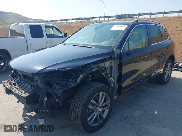 2016 Volkswagen Touareg Sport with VIN WVGEF9BP7GD010252, listed as a IAAI auction lot 42465165 with Not provided miles and . Bid and sale history available at DreamBid. Image 19.