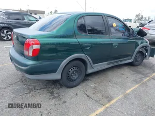 2001 Toyota ECHO with VIN JTDBT123310107980, listed as a IAAI auction lot 42131638 with Not Provided miles and . Bid and sale history available at DreamBid. Image 4.